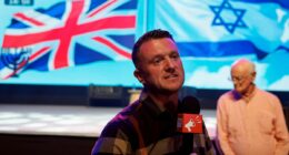 Fury over Tommy Robinson's visit to Israel as he speaks at rally in Tel Aviv while awaiting trial verdict - as critics label his visit a 'slap in the face to British Jewry'