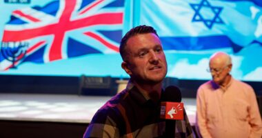Fury over Tommy Robinson's visit to Israel as he speaks at rally in Tel Aviv while awaiting trial verdict - as critics label his visit a 'slap in the face to British Jewry'