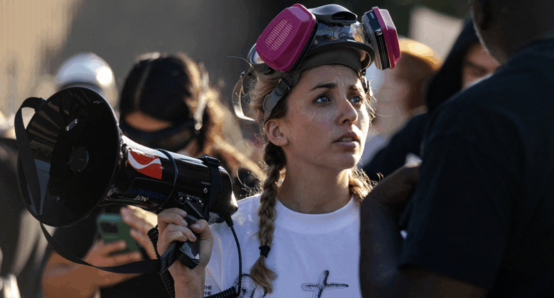 'Gen Z' Dem candidate charged with interfering with ICE posted video of herself in mob blocking unmarked SUV