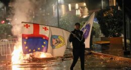 Georgia's ruling party claims landslide win in local vote boycotted by main opposition