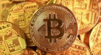 Gold allure beats crypto: Given a choice between bitcoin and bullion - only one offers security, says ALEX BRUMMER