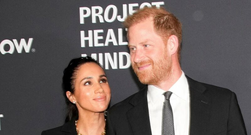 Harry and Meghan walk hand-in-hand as they arrive at glitzy ceremony