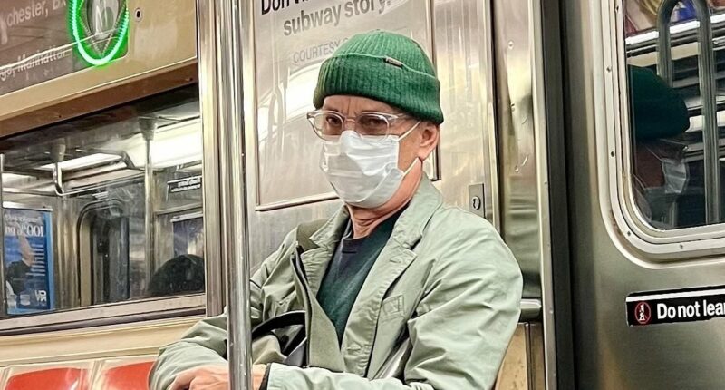 Hollywood star Tom Hanks goes incognito in a mask on NYC subway