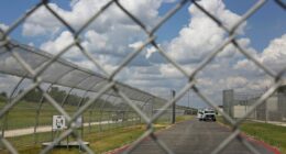 Immigration detention center shooting suspects face terror charges