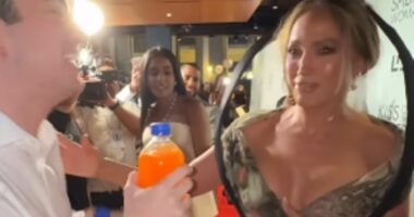 Jennifer Lopez screams she is 'scared' as fan jumps out