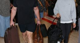 John Cena touches down in Australia in raw public appearance with wife Shay Shariatzadeh ahead of WWE event in Perth