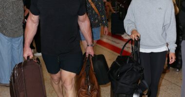 John Cena touches down in Australia in raw public appearance with wife Shay Shariatzadeh ahead of WWE event in Perth