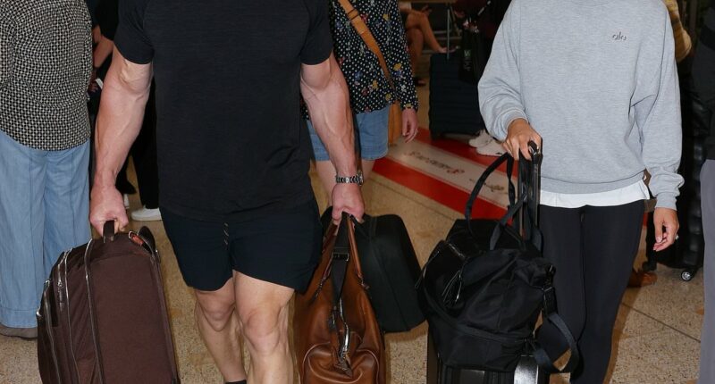 John Cena touches down in Australia in raw public appearance with wife Shay Shariatzadeh ahead of WWE event in Perth
