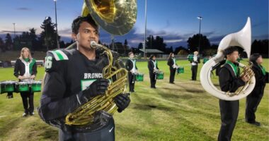 'Juni never gets a break': Football star with 4.0 GPA plays offense, defense, special teams — and tuba