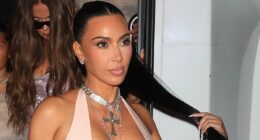 Kim Kardashian nearly spills out of VERY low-cut latex gown