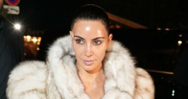 Kim Kardashian wears fur coat as a dress on night out in Paris