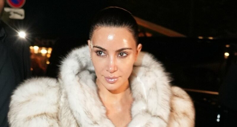 Kim Kardashian wears fur coat as a dress on night out in Paris