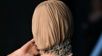 Kim Kardashian wears horrifying MASKED look to starry Hollywood gala