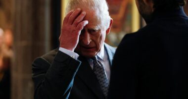 King heckled by protester shouting 'how long've you known'