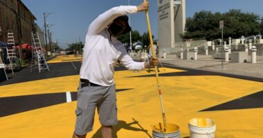 Laredo will remove anti-border-wall street mural after Abbott threatens to pull funding