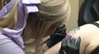 Legally blind tattoo artist shares journey