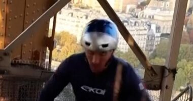Man breaks world record for cycling up Eiffel Tower