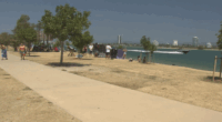 A man has died after being pulled unconscious from the water of a popular Gold Coast beach. The 54-year-old went swimming at The Spit this morning when he ran into trouble. Families nearby used picnic rugs to shelter the man as lifeguards and paramedics performed CPR.
