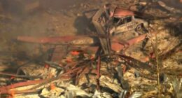 Debris covers the ground and vehicles after a powerful blast ripped through a military explosives manufacturing plant in Hickman County, Tennessee, on October 10.