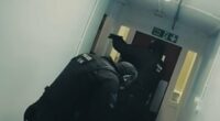 Moment armed officers find three bodies in block of flats