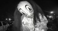 Moment trio in Halloween masks taunt family on doorbell camera