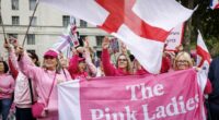 'Pink Lady' anti-migrant protesters descend on Parliament