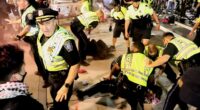 Pro-Palestinian agitators attack police as riot erupts in Dem-run city, officials say