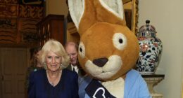 Queen Camilla welcomes Peter Rabbit and Richard Osman for 100th anniversary of children's literature charity at Clarence House