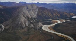 Race against time to build a 211-mile gravel track across America's most extreme frontier for new 'Manhattan Project'... but it could be too late