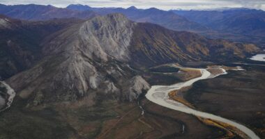 Race against time to build a 211-mile gravel track across America's most extreme frontier for new 'Manhattan Project'... but it could be too late