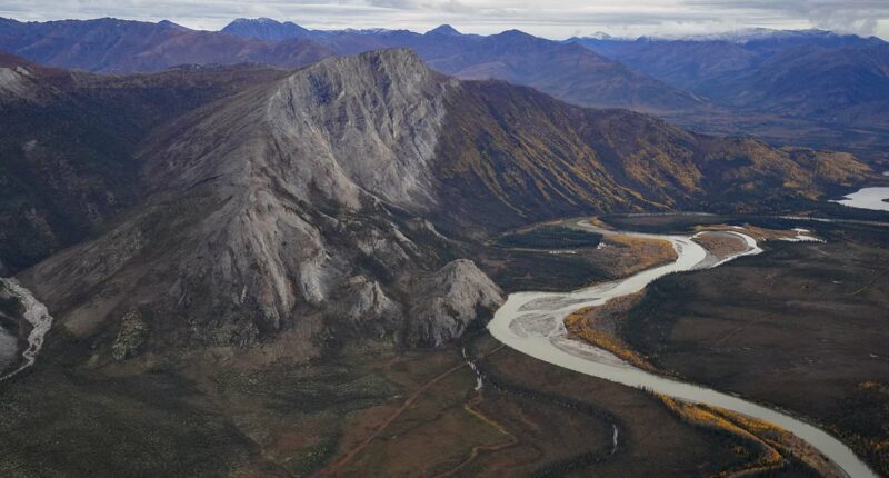 Race against time to build a 211-mile gravel track across America's most extreme frontier for new 'Manhattan Project'... but it could be too late