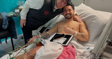 Reality TV star reveals why he's HAPPY that he might have to have his leg amputated after suffering life-threatening injury during footy match