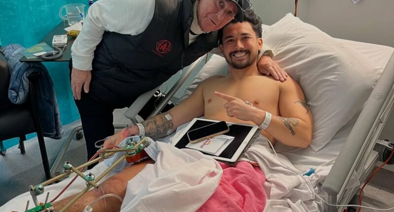 Reality TV star reveals why he's HAPPY that he might have to have his leg amputated after suffering life-threatening injury during footy match