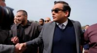 Santos's fines, restitution wiped out by Trump clemency order