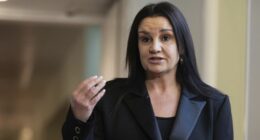 Senator Jacqui Lambie addresses the media