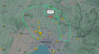 A Melbourne flight bound for Singapore is diverting back to Tullamarine airport after witnesses described seeing it flying low and dumping fuel.