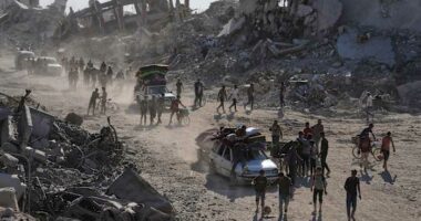 Some Palestinians pack up and move north toward their homes in Gaza after ceasefire goes into effect
