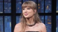 Taylor Swift wows in strapless corset mini on the Seth Meyers show