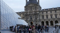 The Louvre reopens three days after thieves took French crown jewels in a daylight heist at the Paris museum