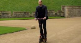 The Prince of Wheels! Moment William cruises through Windsor Castle grounds on an e-scooter during appearance on Eugene Levy's travel show