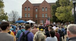 Thousands rally at "No Kings" protest in Urbana