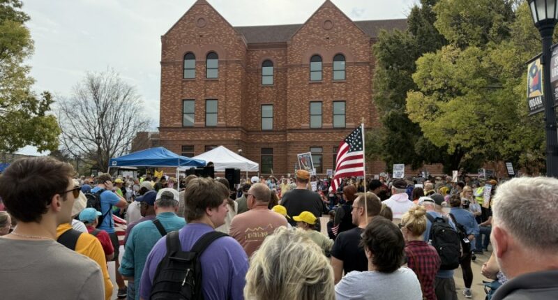 Thousands rally at "No Kings" protest in Urbana