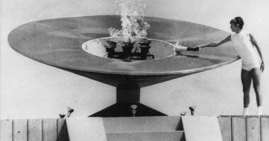 Today in History: October 12, First woman lights Olympic flame