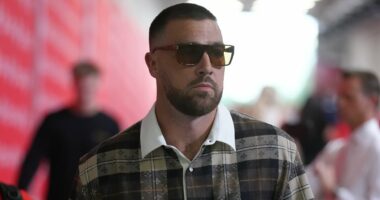 Travis Kelce appears to reference Taylor Swift with lumberjack outfit