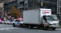 Truck hits parked van in Midtown Manhattan, pushing vehicle onto sidewalk and injuring 9
