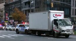 Truck hits parked van in Midtown Manhattan, pushing vehicle onto sidewalk and injuring 9