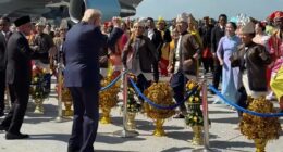 Trump performs fist-pump dance with Malaysian artists