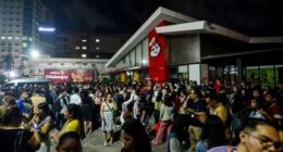 People gather on a street after earthquake tremors at Cebu in central Philippines on September 30.
