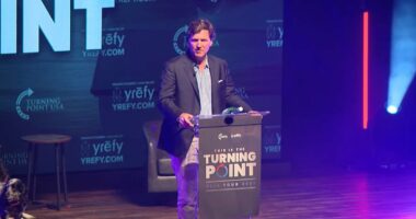 Tucker threatens to beat up student who raised his father's CIA ties