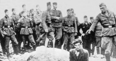 Unmasked after 80 years - the Nazi executioner in infamous WWII photo